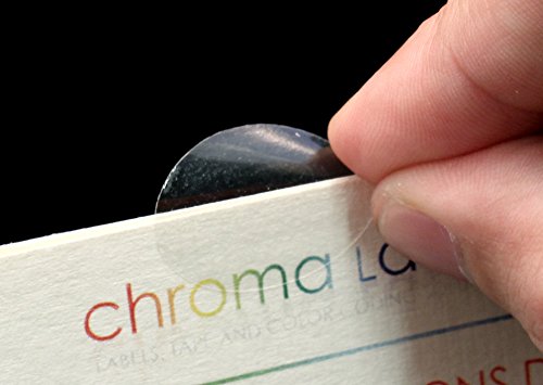 Clear oval wafer seals by ChromaLabel, 0.75 x 1 inch, perforated labels on a roll, ideal for secure sealing or labeling.