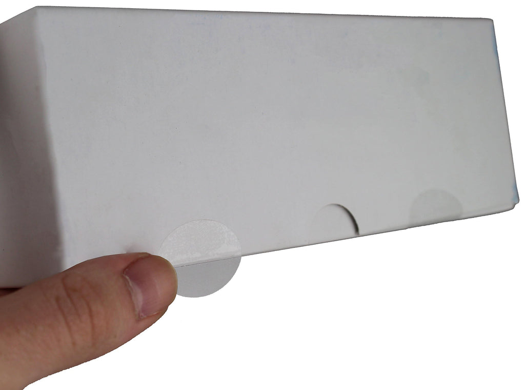 ChromaLabel clear oval wafer seals, 0.75 x 1 inch, perforated labels on roll, shown in close-up image.