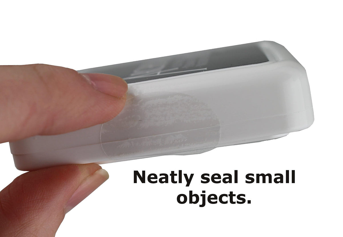 ChromaLabel clear oval wafer seals, 0.75 x 1 inch, perforated labels on roll, 5000 per roll for packaging or sealing.