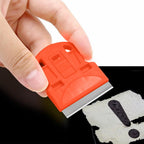 DEPOTA 2-pack plastic razor blade scraper with 10 metal blades, ideal for removing labels, stickers, and adhesive from glass surfaces.