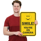SmartSign "Smile You're On Camera" Sign | 12" x 18" Aluminum