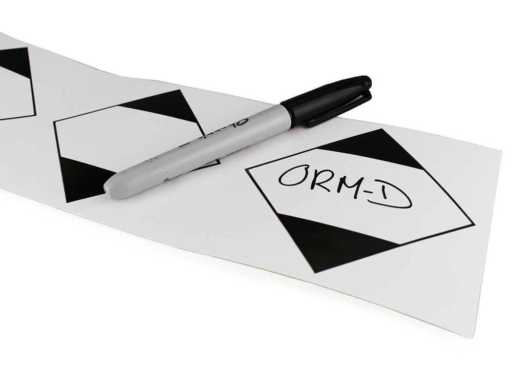 ChromaLabel 4x4 inch ORM-D ground shipping labels on a roll, industrial labels for safe parcel identification and handling.