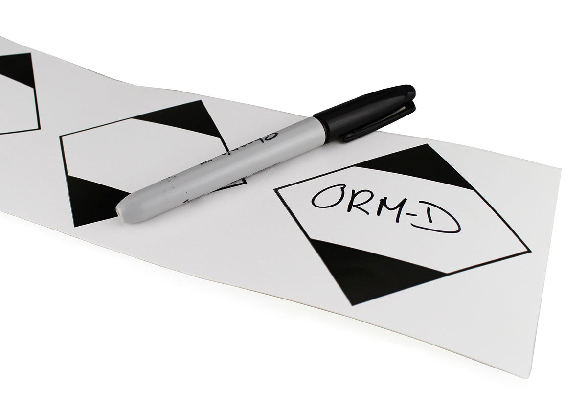 ChromaLabel 4x4 inch ORM-D ground shipping labels on a roll, industrial labels for safe parcel identification and handling.