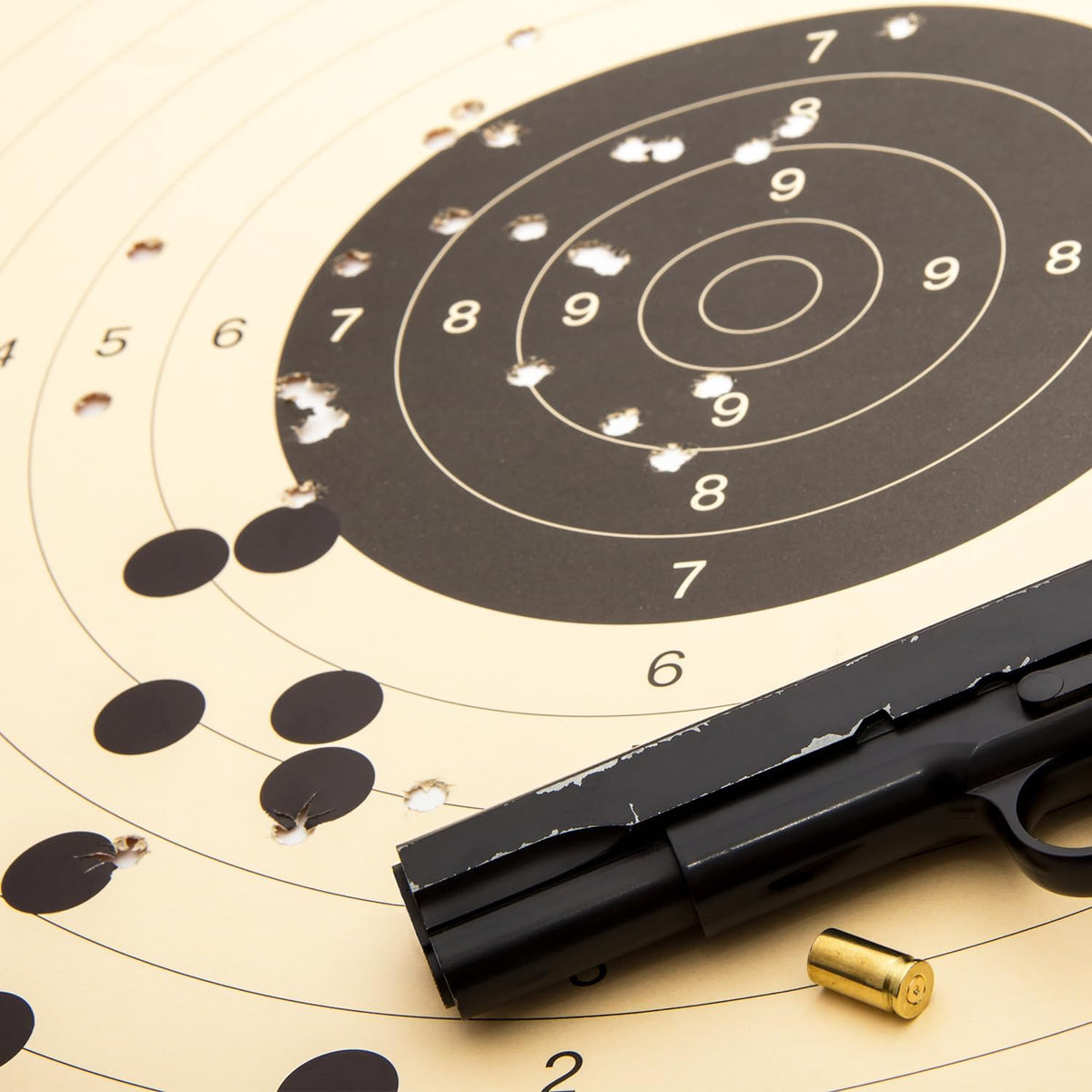 ChromaLabel 1-inch black round target pasters for shooting, 1000 labels in dispenser box, ideal for marksmanship and training.