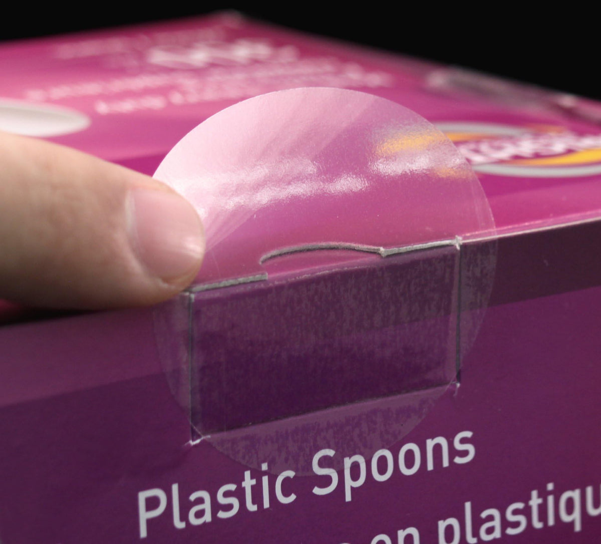 ChromaLabel 2-inch clear round wafer seals on a roll, 500 per pack, used for labeling or sealing in various applications.