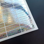 All-purpose silver hologram tamper-proof security labels with serial numbers, designed to verify authenticity and prevent tampering.