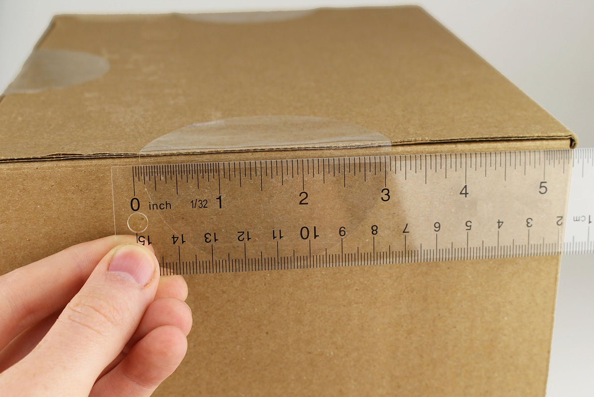 ChromaLabel 3-inch clear round wafer seals on a roll, all-purpose labels for sealing and labeling packages or jars.