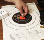 ChromaLabel 0.75 inch round kraft target pasters for shooting, 1000 labels per dispenser box, ideal for marksmanship and training.