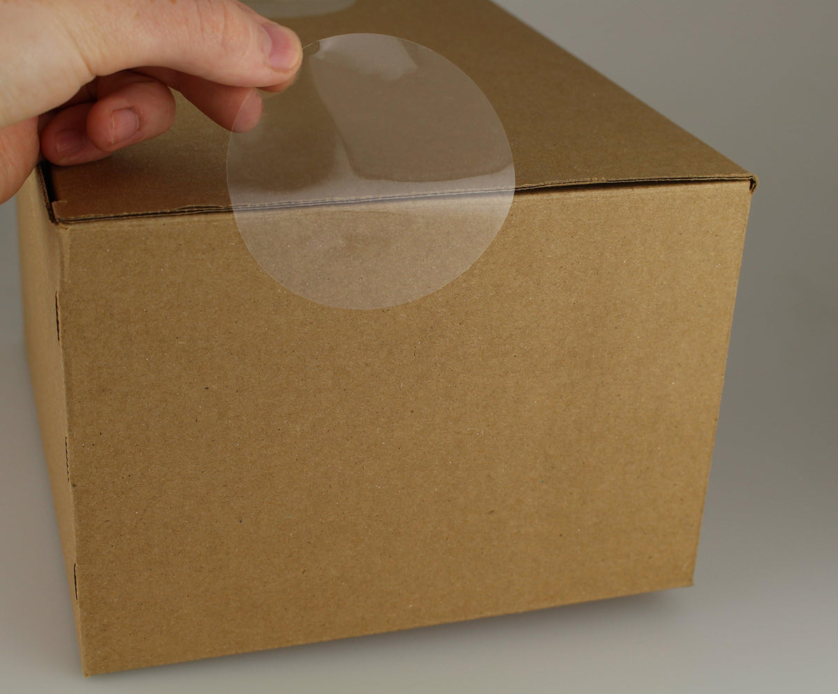 ChromaLabel 3-inch clear round wafer seals on a roll, all-purpose labels for various packaging and labeling needs.