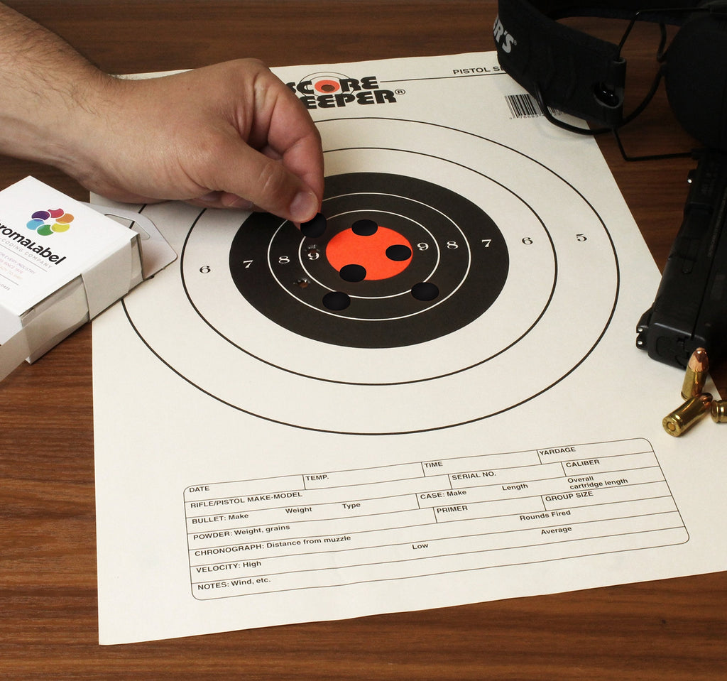 ChromaLabel 0.50 inch black round target pasters for shooting, 1000 labels in a dispenser box, ideal for marksmanship.
