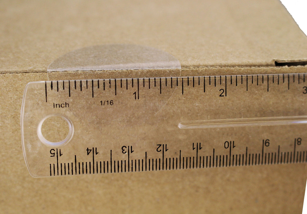 ChromaLabel 1.50-inch round clear wafer seals on a roll, all-purpose labels, non-perforated, 500 per roll for versatile sealing uses.