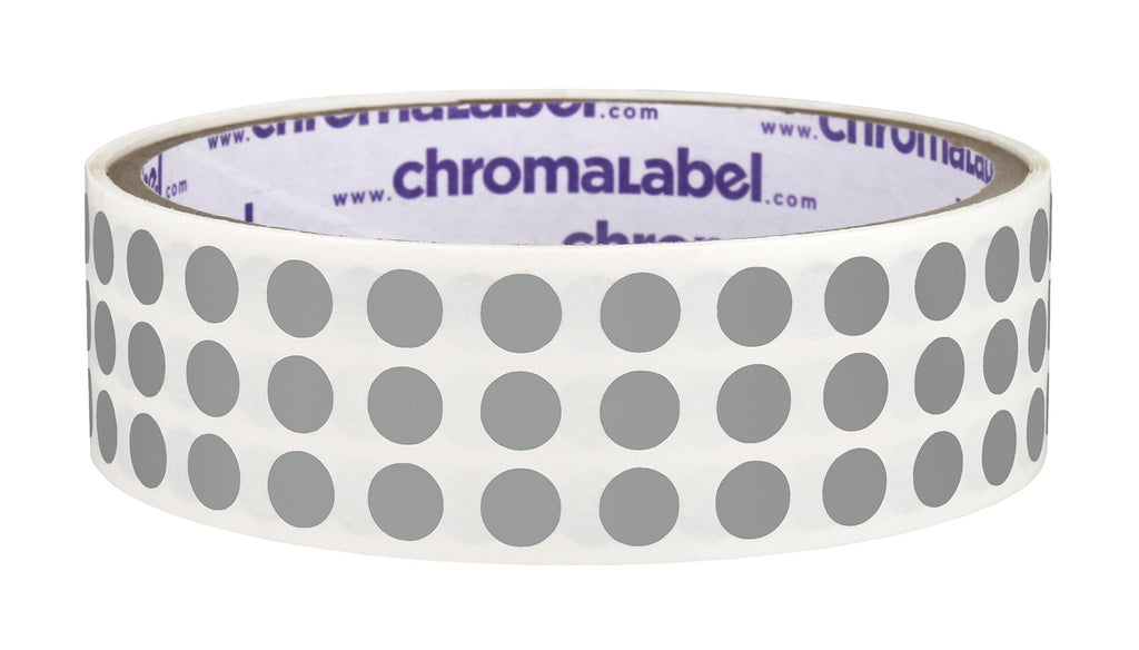 Gray ChromaLabel 0.25 inch round color-coding stickers, permanent dot labels on a roll for organizing and labeling tasks.