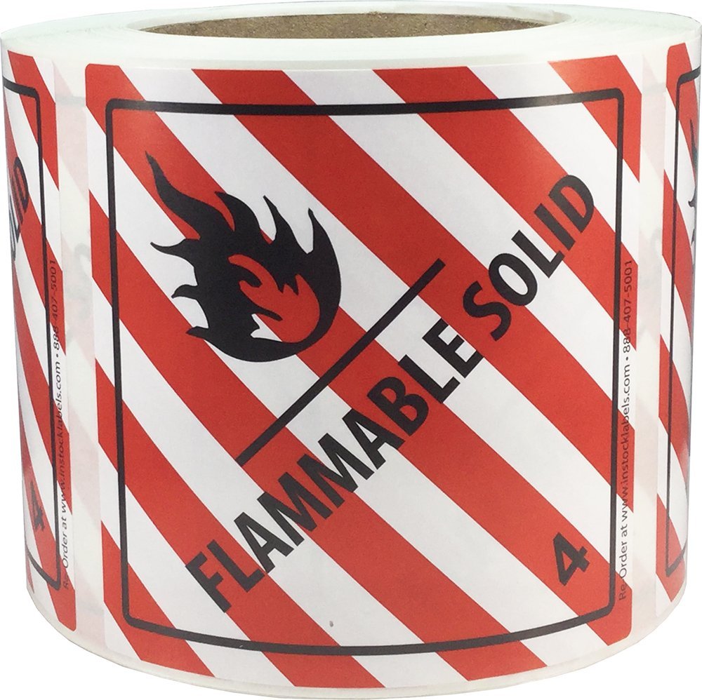 Hazard Class 4 D.O.T. flammable solid labels, 4x4 inch red and white stickers on a roll for shipping compliance.