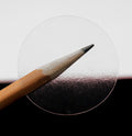 ChromaLabel 1.50 inch round clear wafer seals for all-purpose labeling, non-perforated, 500 per roll, transparent adhesive labels.