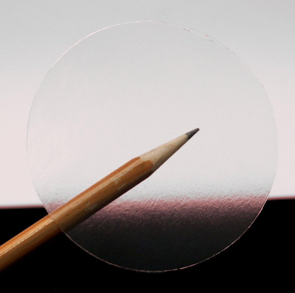 ChromaLabel 3-inch clear round wafer seals on a roll, all-purpose labels for packaging and sealing applications.