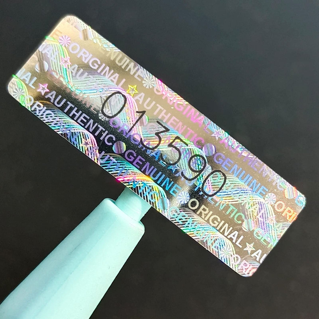 Silver hologram tamper-proof stickers with sequential serial numbers, security labels for warranty and product verification.